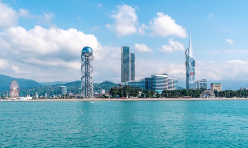 Batumi, Georgia - 08.05.2019: View From Sea To Resort Town Cityscape With Skyscrapers And Alphabet Tower in Batumi, travel